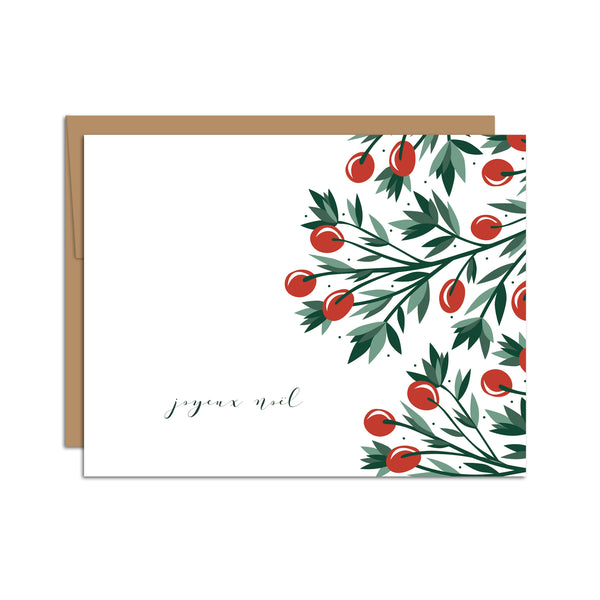 Single folded A2 greeting card with an envelope with an illustration of red holly berries and green leaves bordering the right side of the card. On the bottom left side of the card is text in cursive that states "Joyeux Noel".