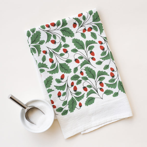 A single 100% cotton flour sack towel with an illustration of strawberries