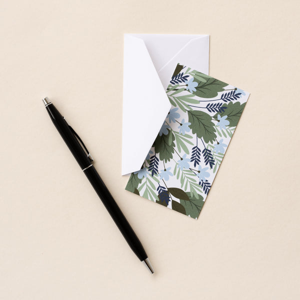 Set of 10 flat mini note cards with envelopes and an illustrated pattern of blue flowers and green leaves.