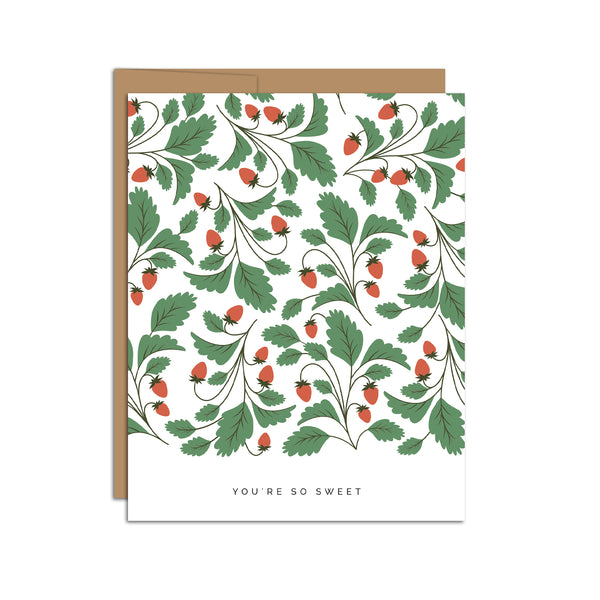 Single folded A2 greeting card with an envelope with an illustration of strawberries and leaves throughout the whole card with text below it stating "You're So Sweet".