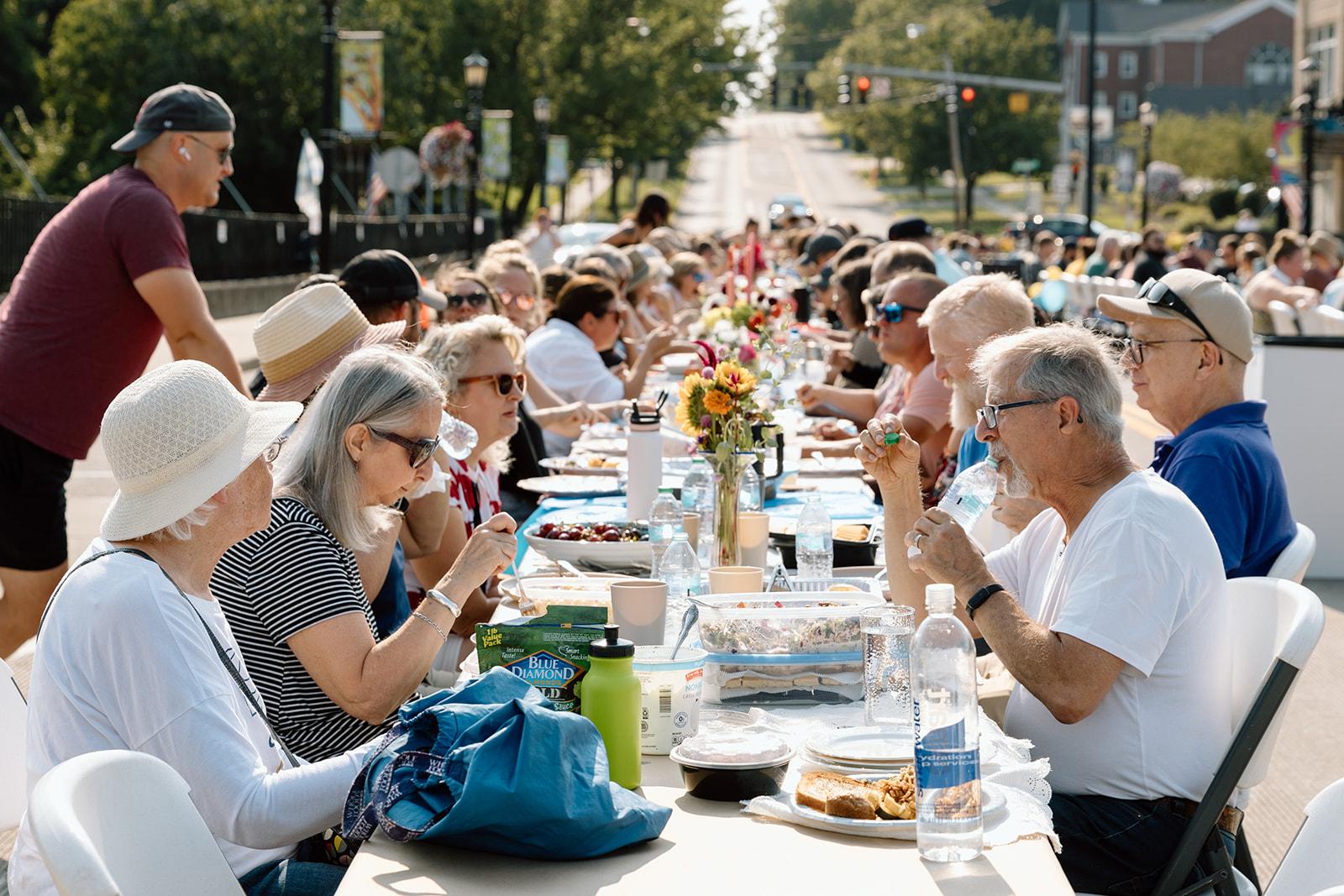 A photo of The Longest Table on the bridge in Downtown Kent