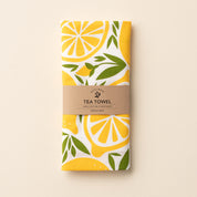 Folded Lemon Tea Towel with wrap band and hand-illustrated lemon design