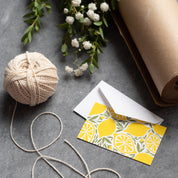 Lemons Mini Note Card styled with twine and wrapping paper on a dark surface