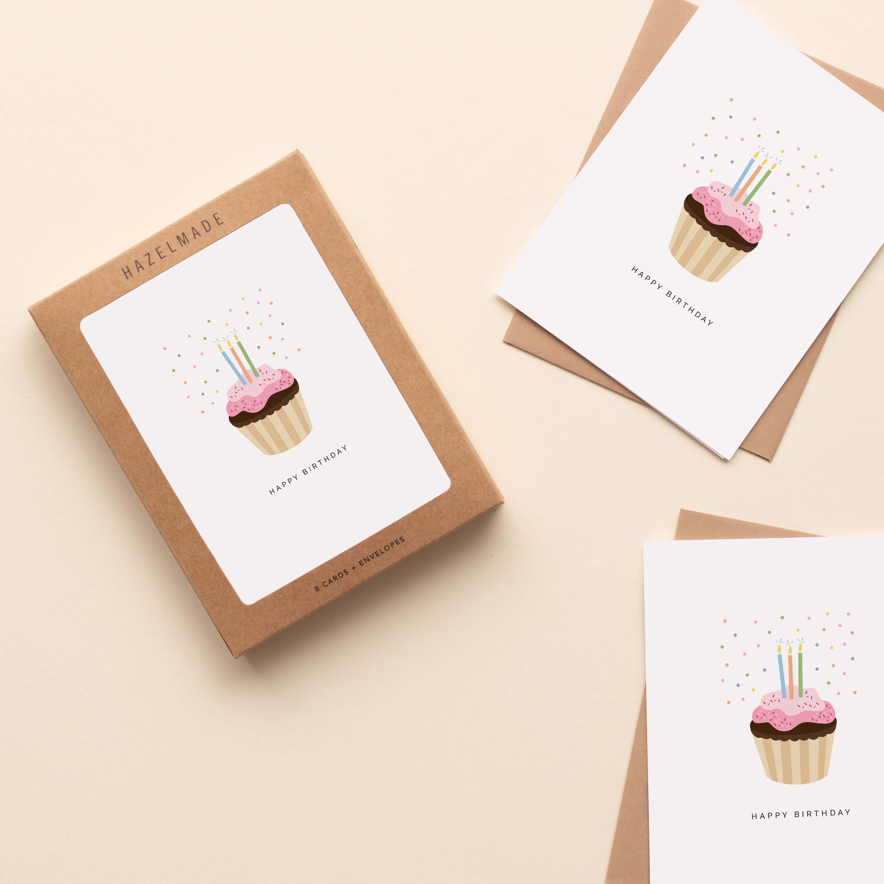 Boxed set of Happy Birthday Cupcake Greeting Cards with two cards and envelopes featuring a hand-illustrated cupcake with candles design