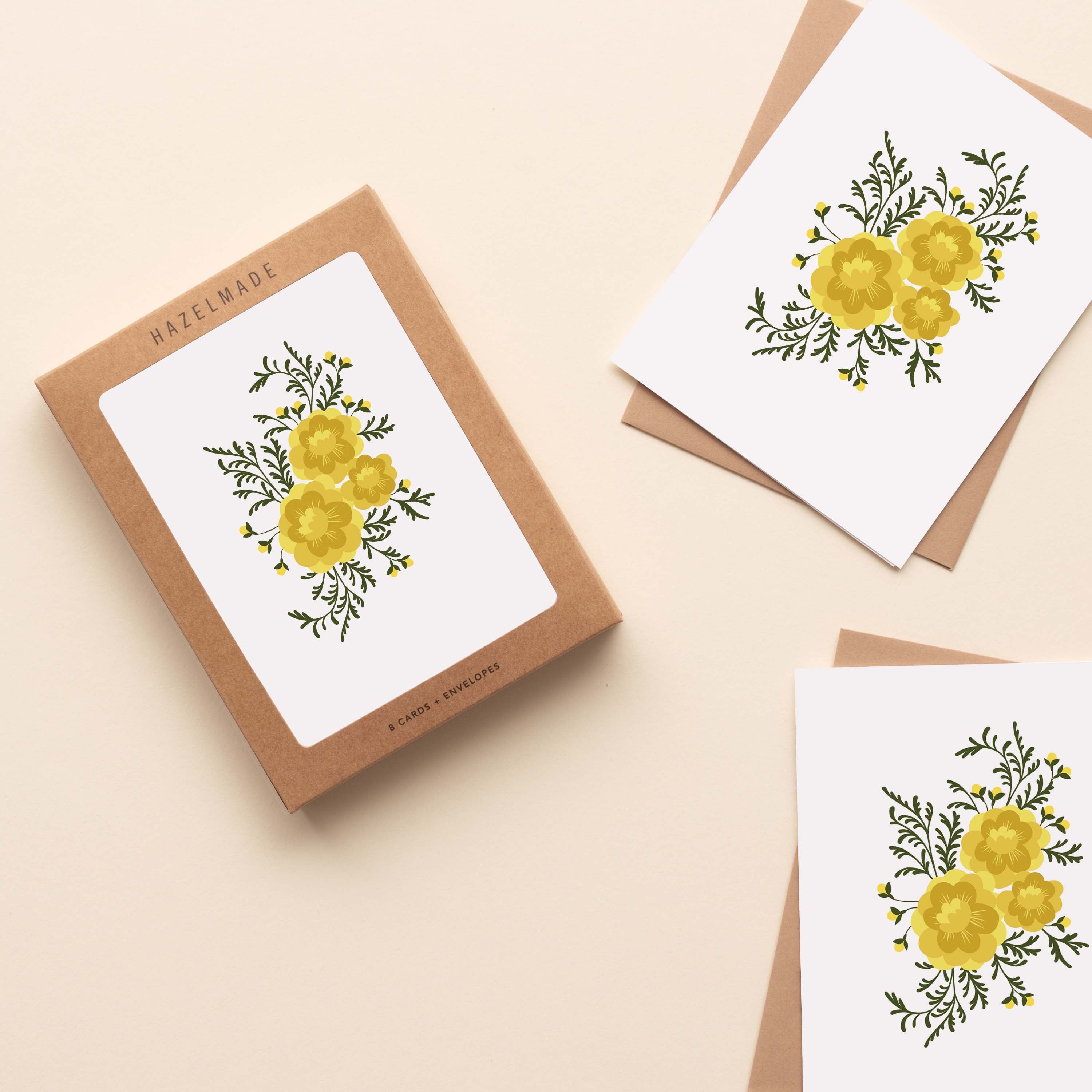 Boxed set of Marigolds Greeting Cards with two cards and envelopes featuring a hand-illustrated yellow marigold design
