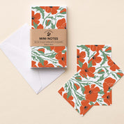 Poppies Mini Note Cards set with white envelope and wrap band shown on a neutral background