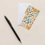 Farmstand Fruits Mini Note Card with white envelope beside a black pen on a neutral background
