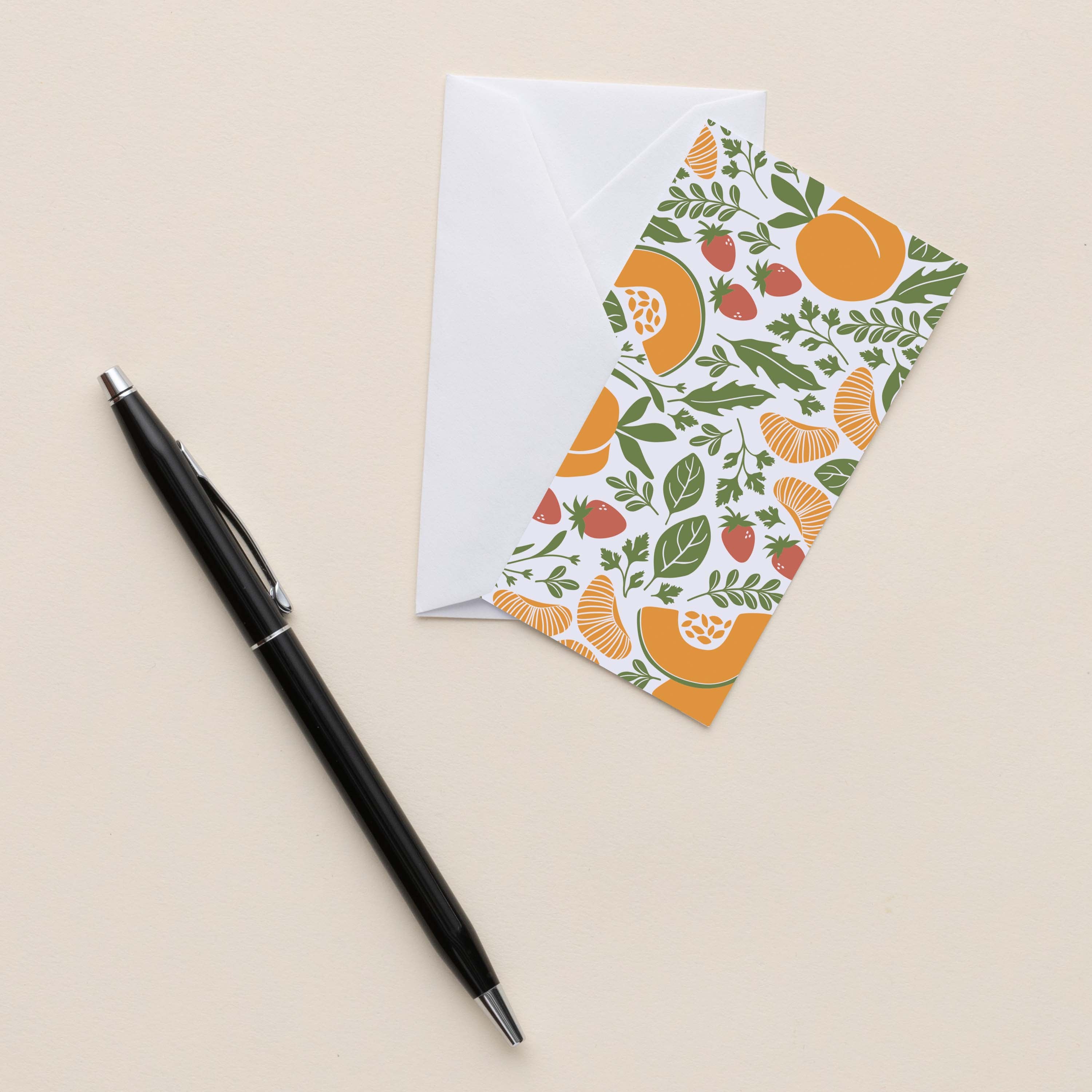 Farmstand Fruits Mini Note Card with white envelope beside a black pen on a neutral background