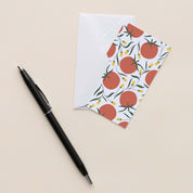 Tomatoes Mini Note Card with white envelope beside a black pen on a neutral background