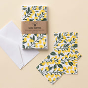 Sundrops Mini Note Cards set with white envelope and wrap band shown on a neutral background