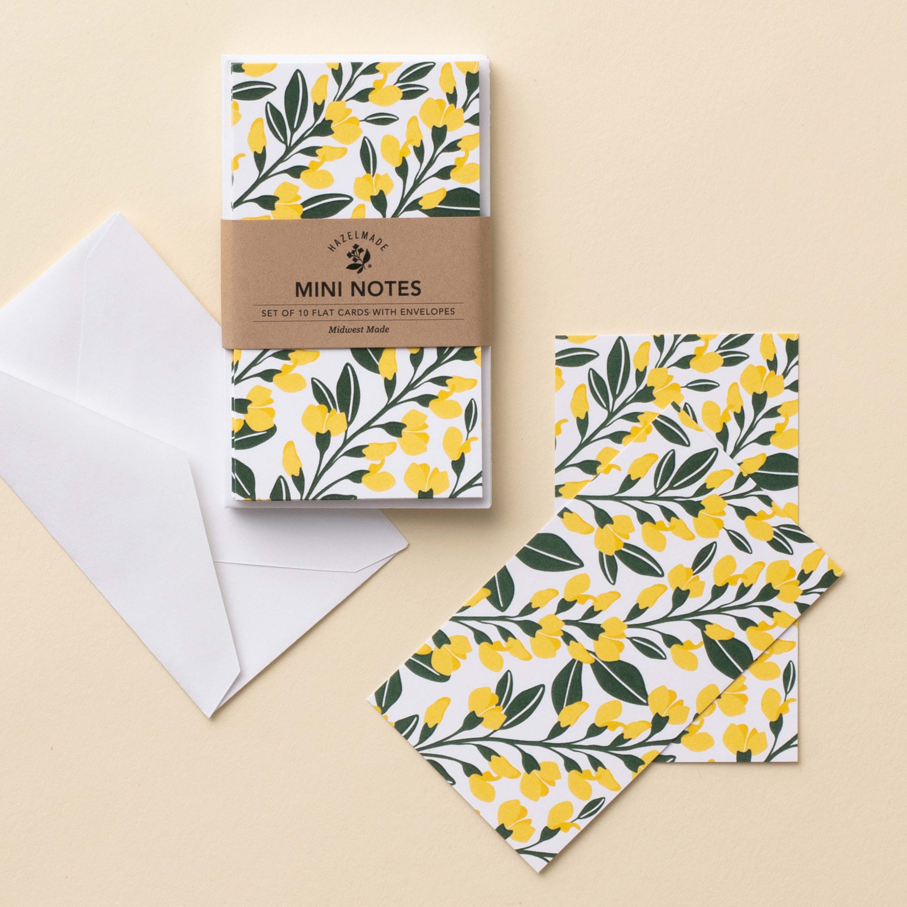 Sundrops Mini Note Cards set with white envelope and wrap band shown on a neutral background