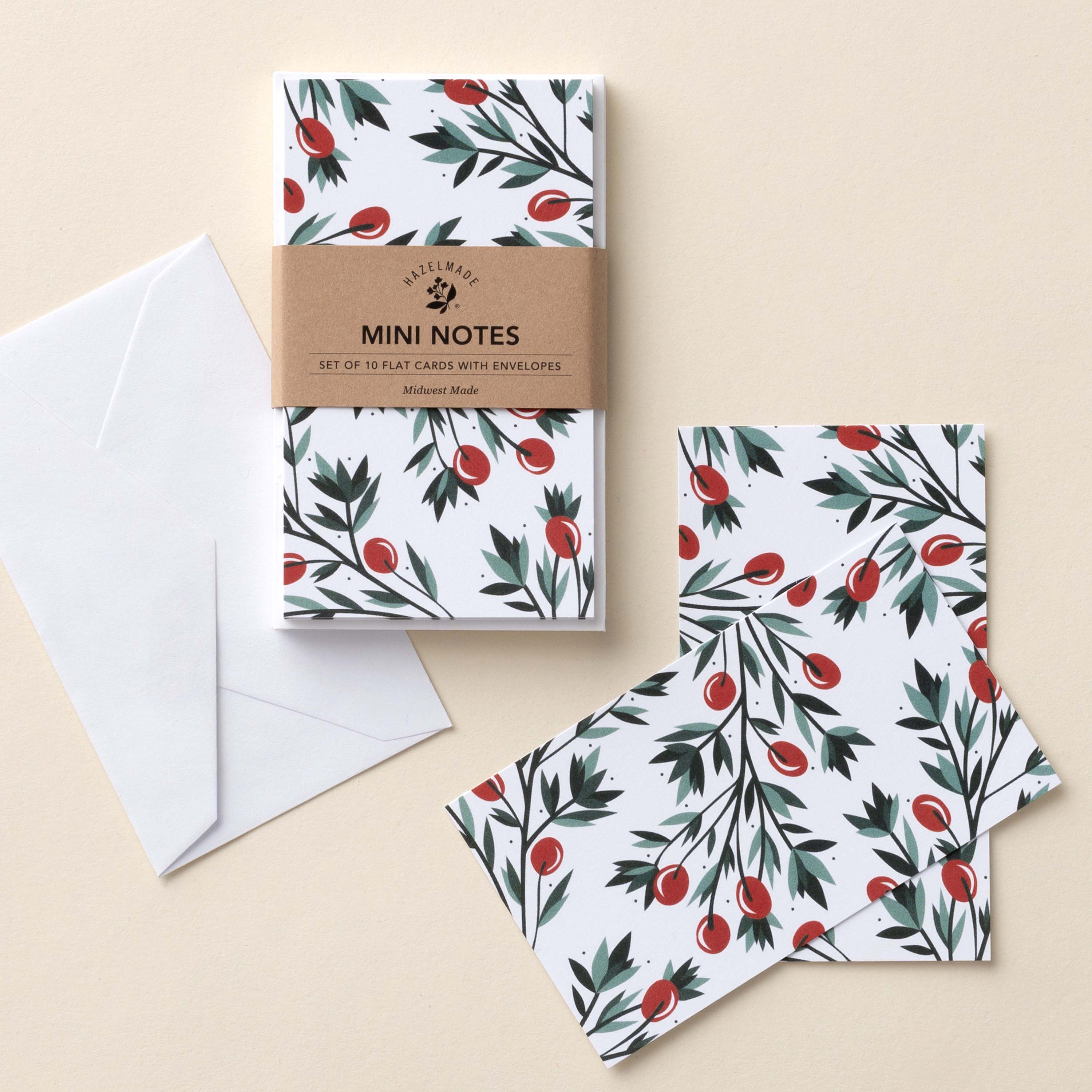 Holly Mini Note Cards set with white envelope and wrap band shown on a neutral background