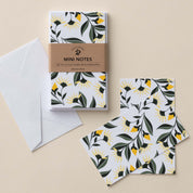 Aster Flowers Mini Note Cards set with white envelope and wrap band shown on a neutral background