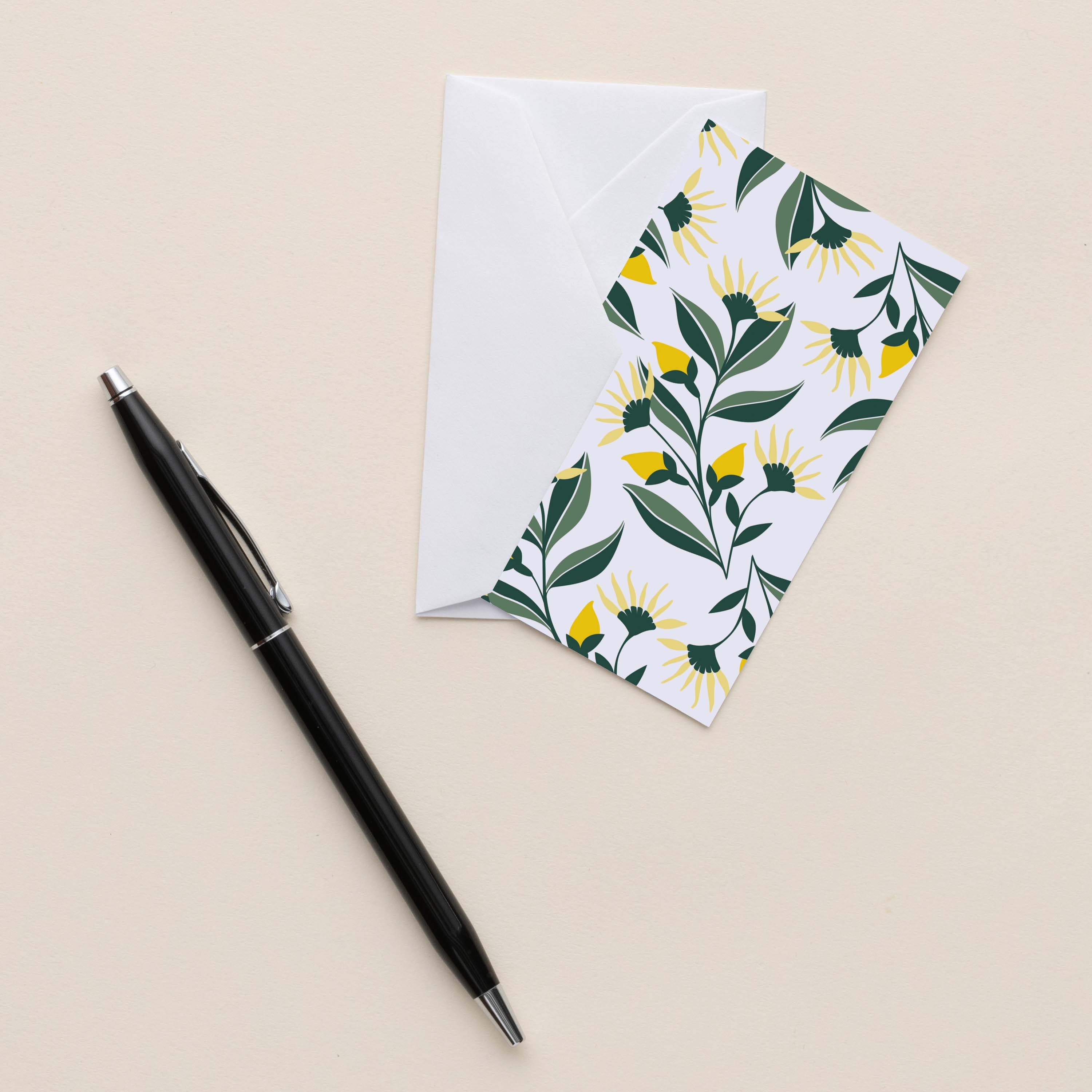 Aster Flowers Mini Note Card with white envelope beside a black pen on a neutral background