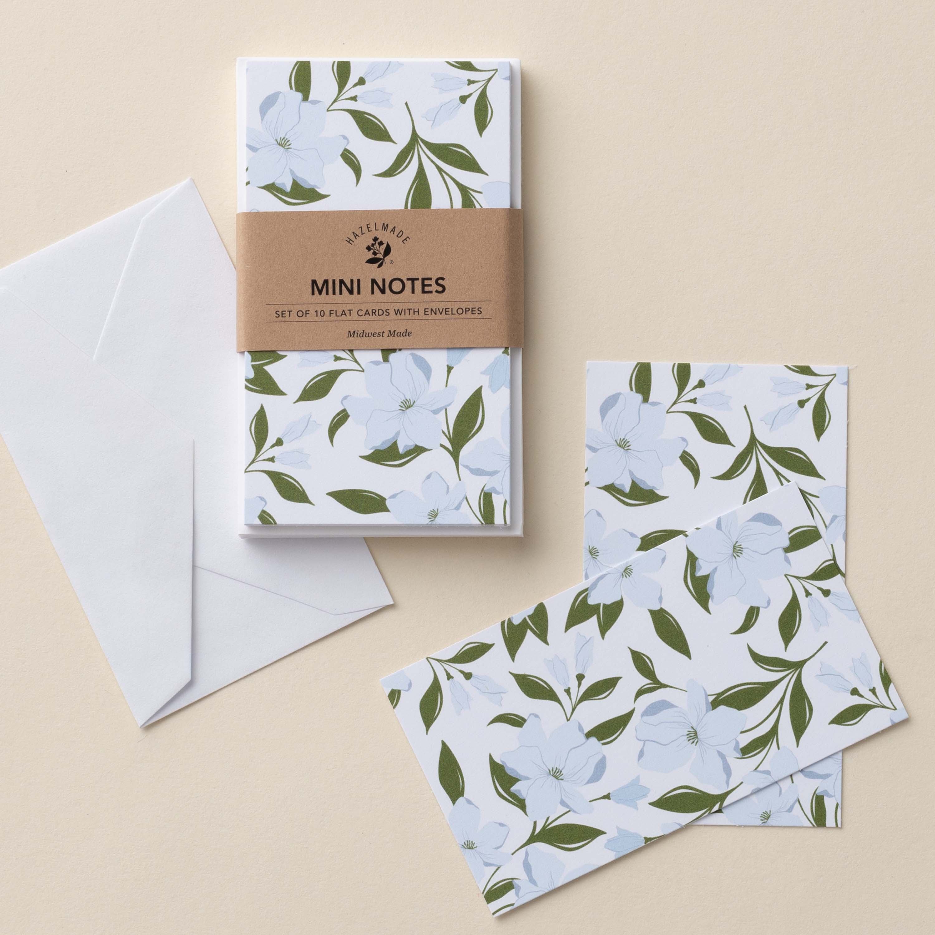 Dogwood Flowers Mini Note Cards set with white envelope and wrap band shown on a neutral background