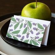 Blackberry Vines Mini Note Card and envelope styled beside a green apple on a plate