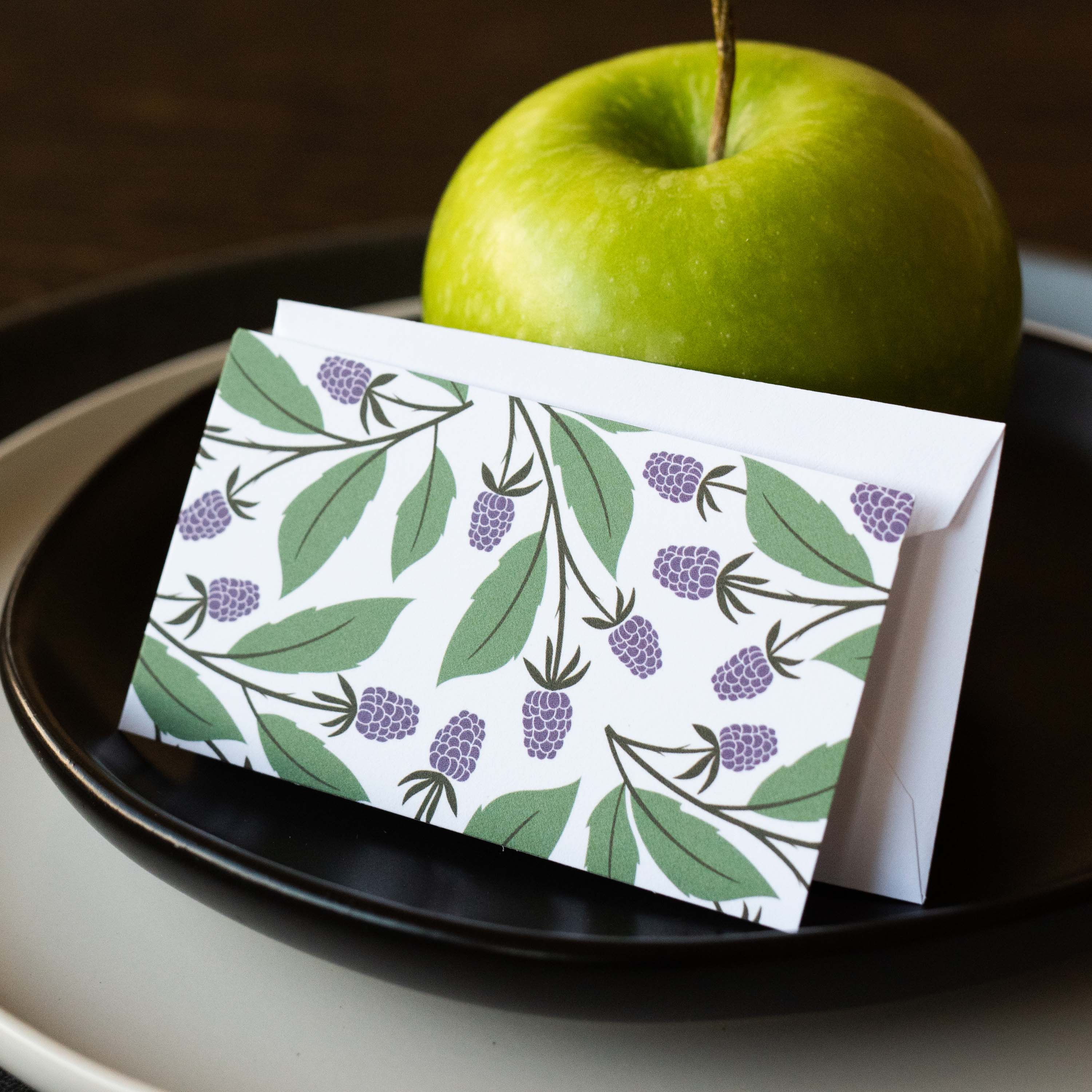 Blackberry Vines Mini Note Card and envelope styled beside a green apple on a plate