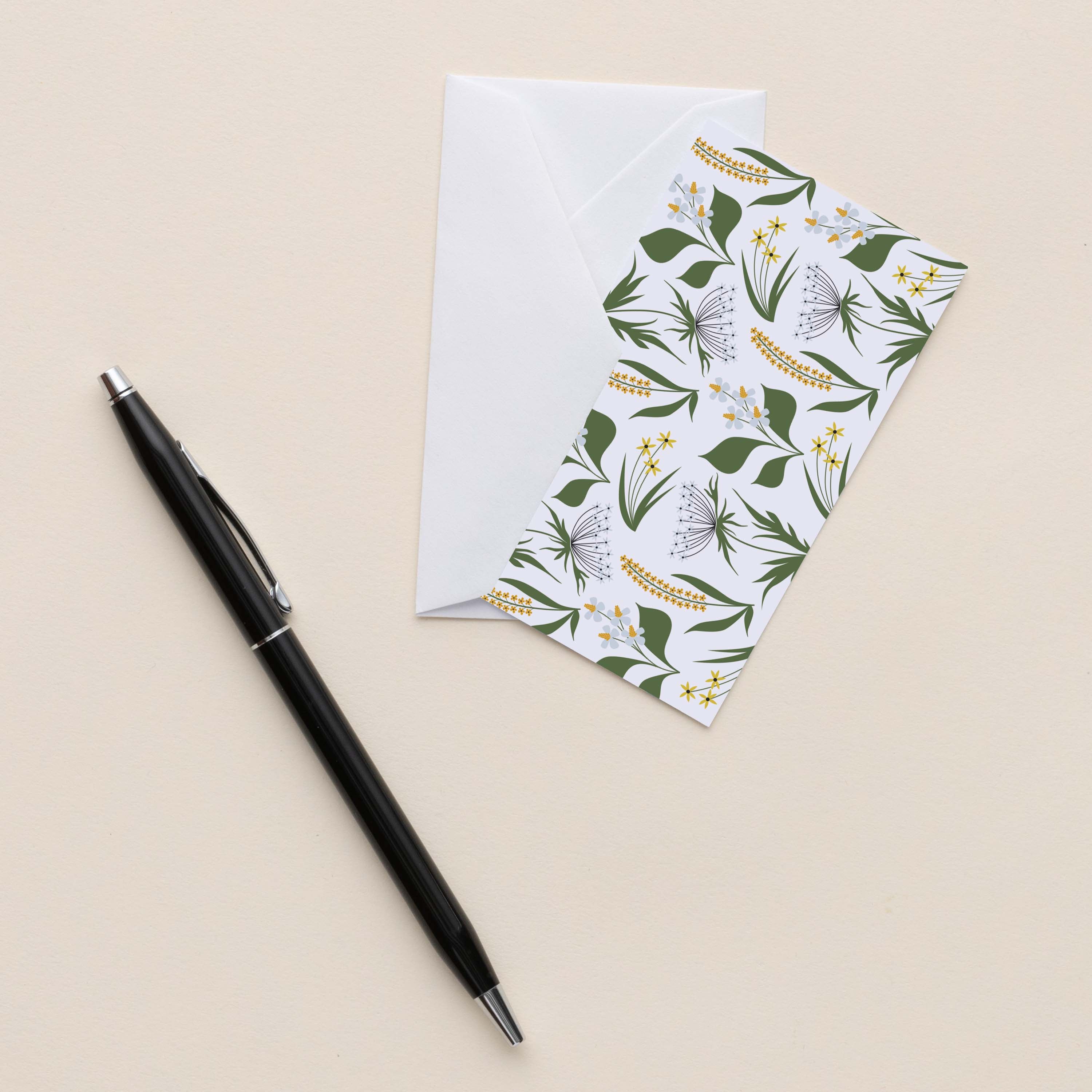 Wildflowers Mini Note Card with white envelope beside a black pen on a neutral background