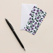 Tulips Mini Note Card with white envelope beside a black pen on a neutral background