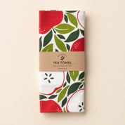Folded Harvest Apples Tea Towel with wrap band and hand-illustrated apple design