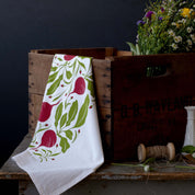 Beets Tea Towel styled with a wooden crate and wildflowers