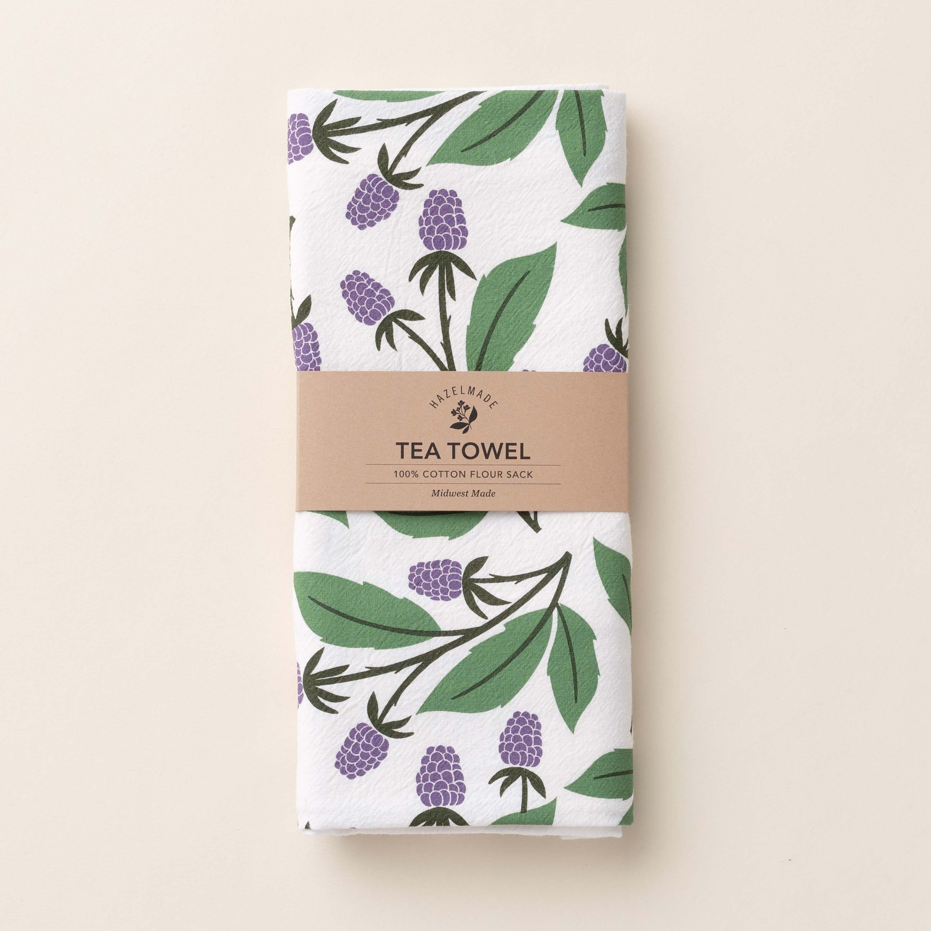 Folded Blackberry Vines Tea Towel with wrap band and hand-illustrated blackberry vine design