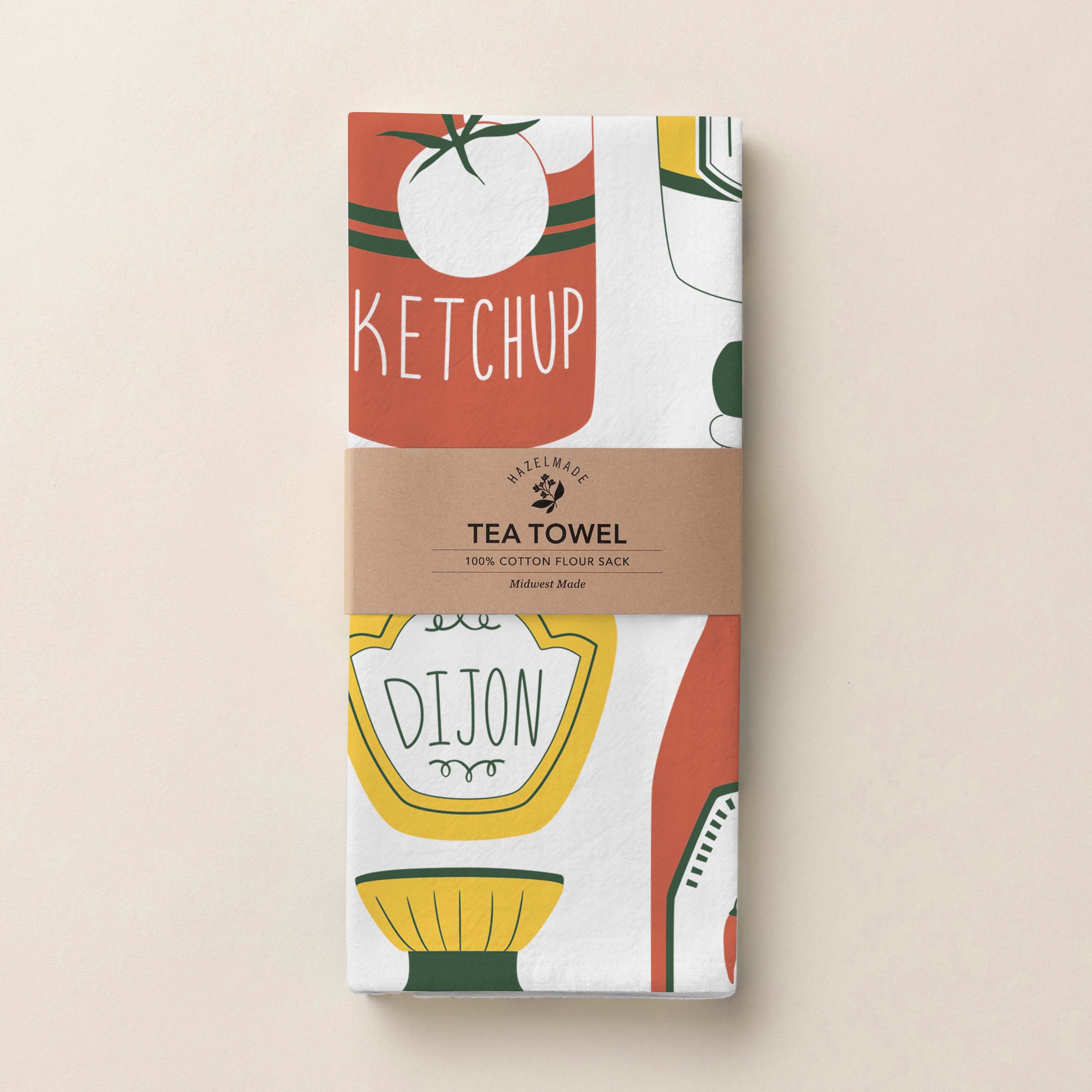 Folded Classic Condiments Tea Towel with wrap band and hand-illustrated condiment design