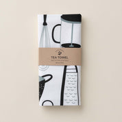 Folded Kitchen Utensils Tea Towel with wrap band and hand-illustrated kitchen utensil design