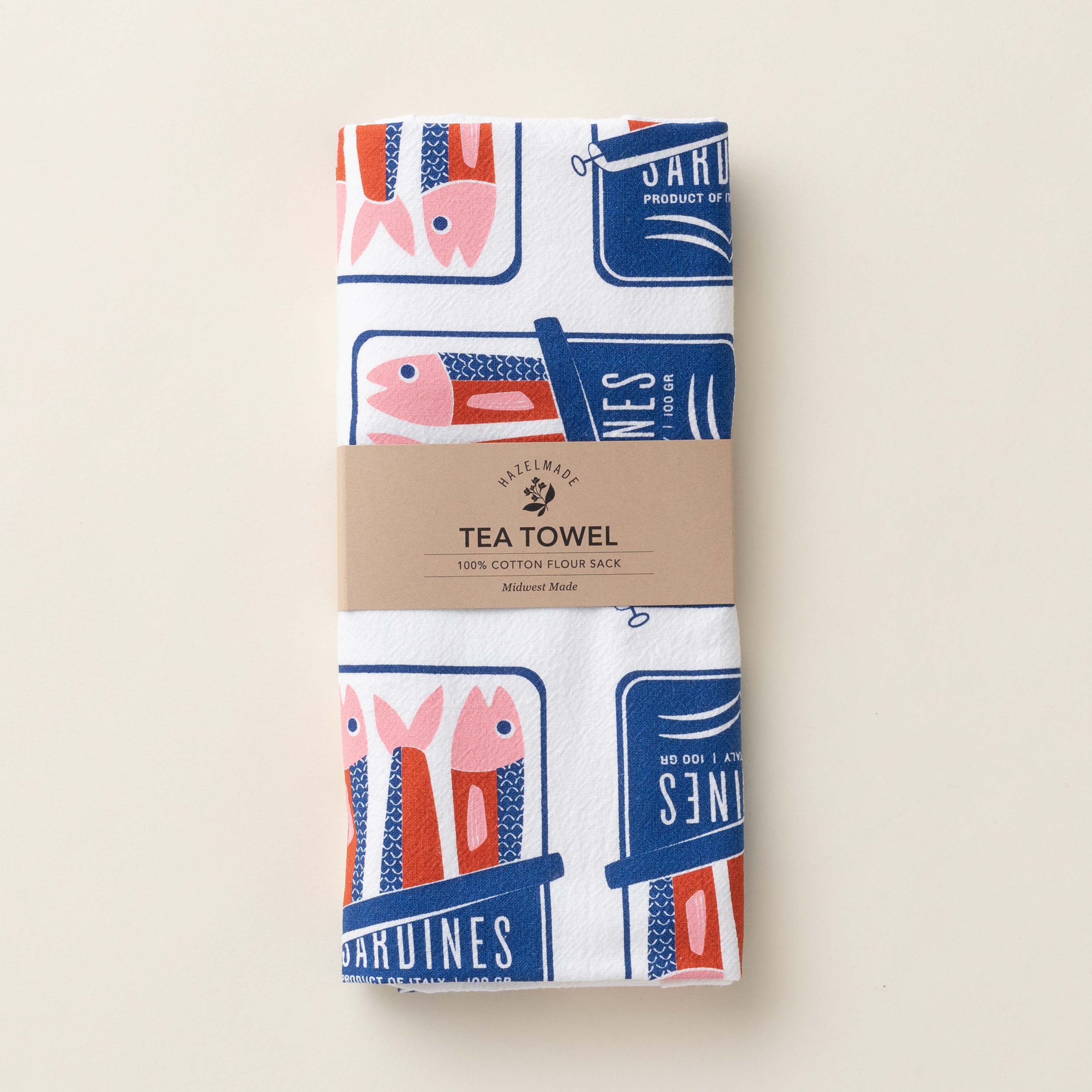 Folded Sardines Tea Towel with wrap band and hand-illustrated sardine tin design