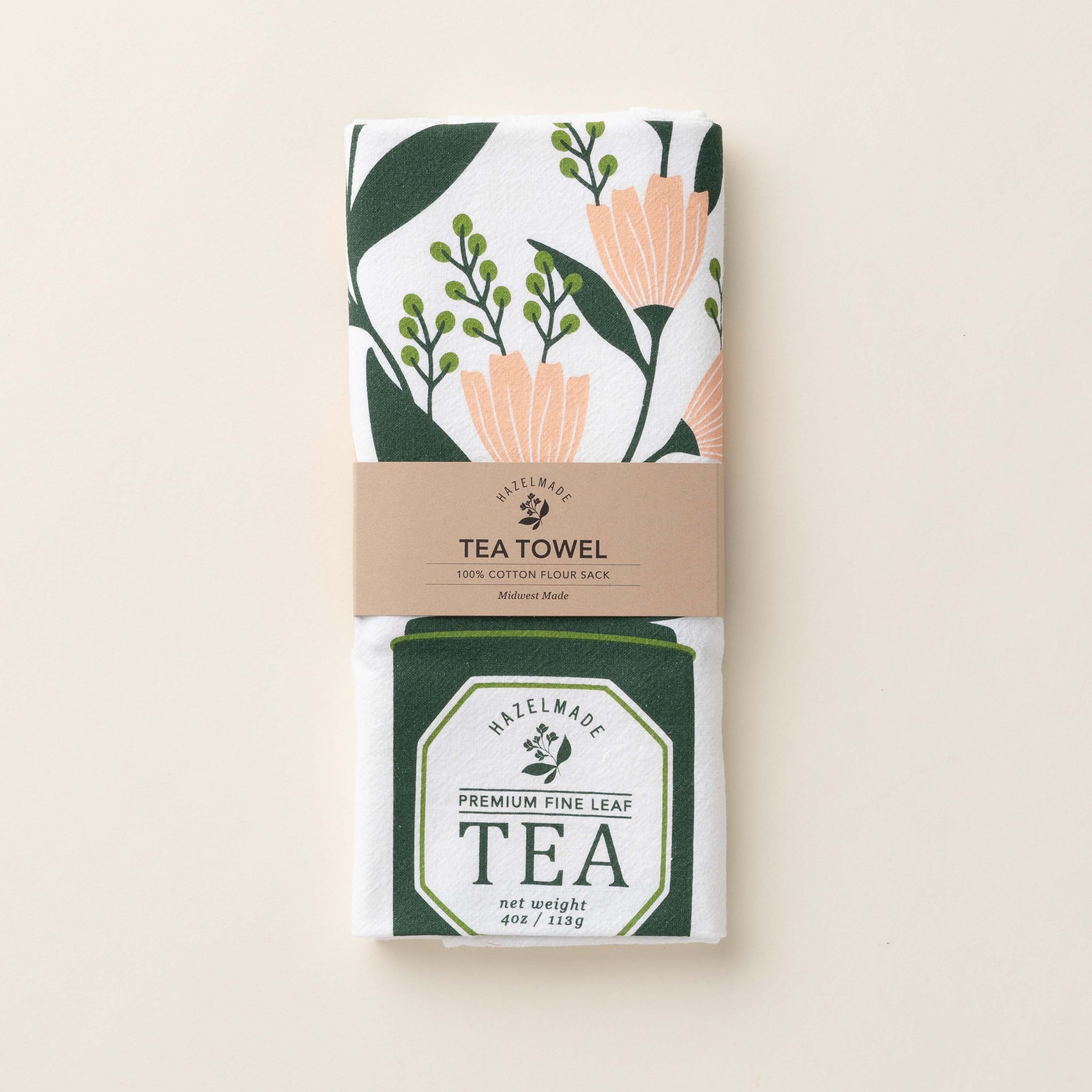 Folded Tea Tin Bouquet Tea Towel with wrap band and hand-illustrated floral tea tin design