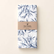 Folded Winter Branch Tea Towel with wrap band and hand-illustrated winter branch design