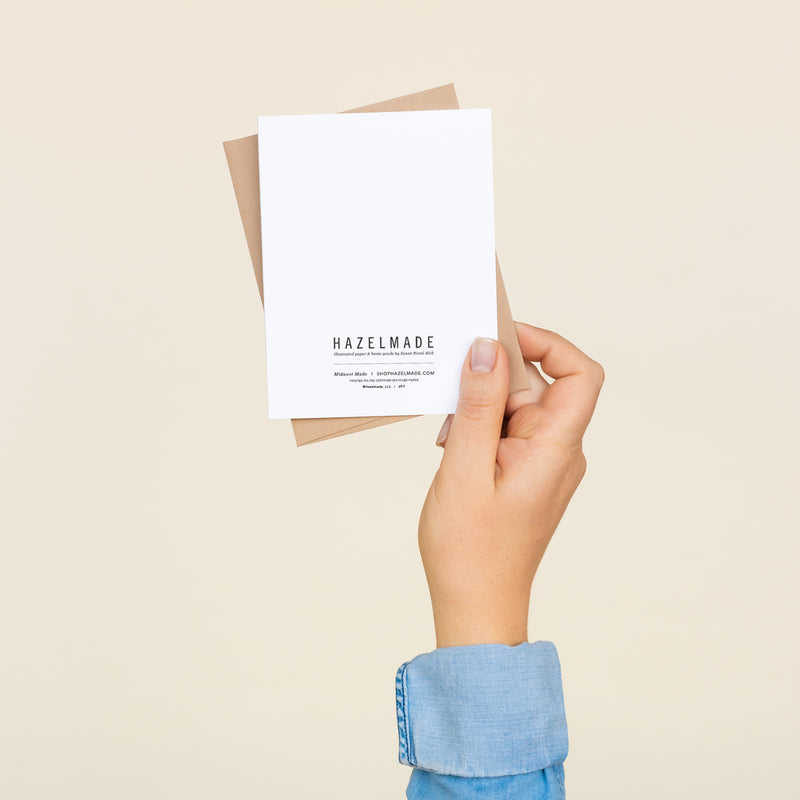 Back of a folded A2 greeting card with a blank area and logo information