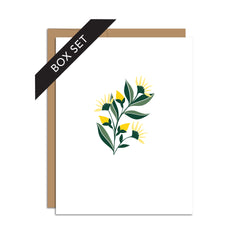 Box set of 8 folded A2 greeting cards with envelopes with an illustration of yellow aster flowers in the center of the card.