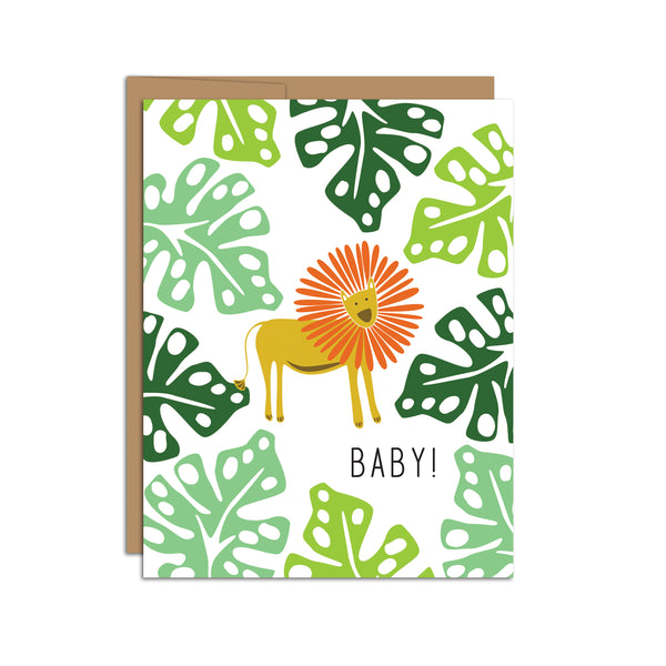 Single folded A2 greeting card with an envelope with an illustration of a lion surrounded by light and dark green jungle leaves. Below the lion is text that states "Baby!".