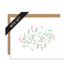 Box set of 8 folded A2 greeting cards with envelopes with an illustration  of multiple green leaves and red berries.