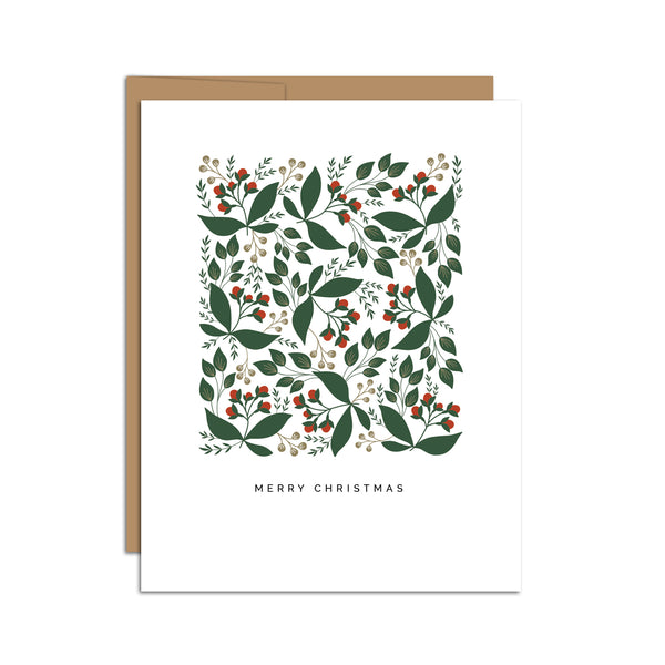 Single folded A2 greeting card with an envelope with an illustration of green leaves and red berries. Below this pattern is text that states "Merry Christmas".