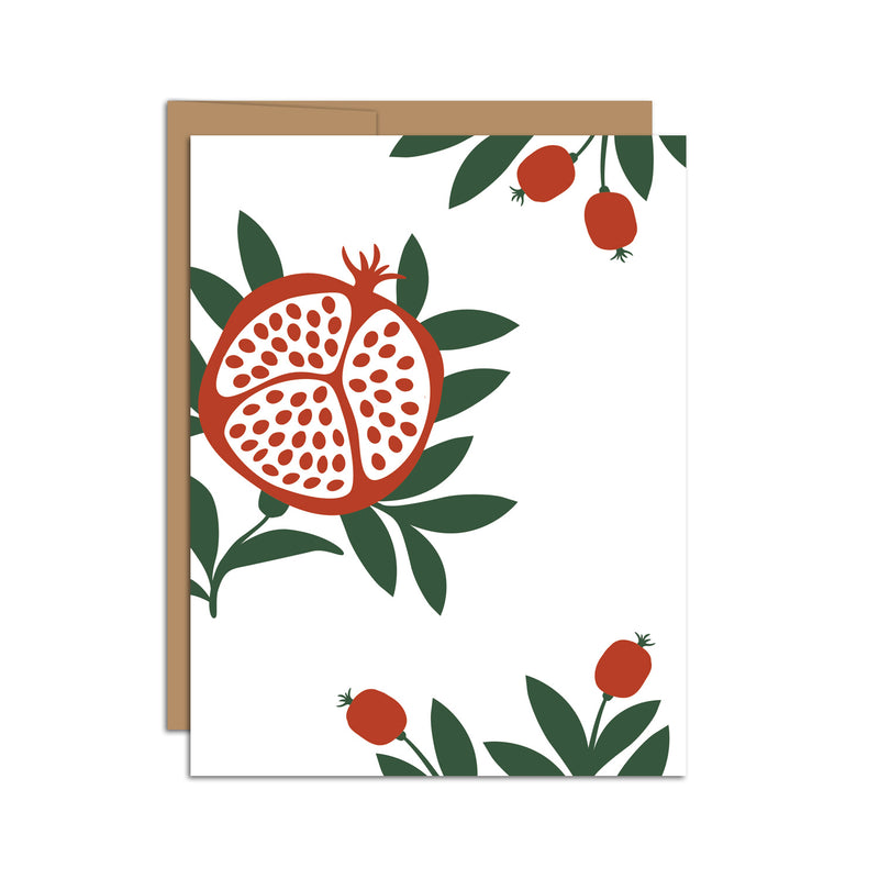 Single folded A2 greeting card with an envelope with an illustration of a pomegranate with seeds and green leaves.