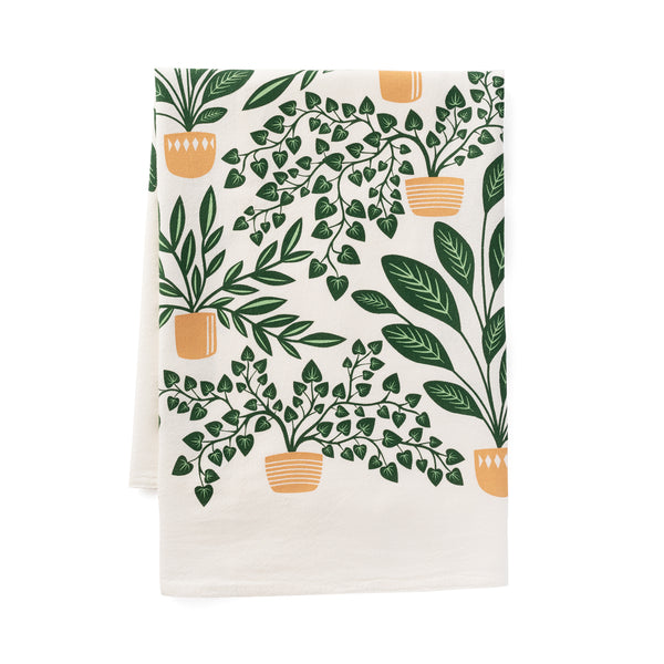 A single 100% cotton flour sack towel with an illustration of potted houseplants