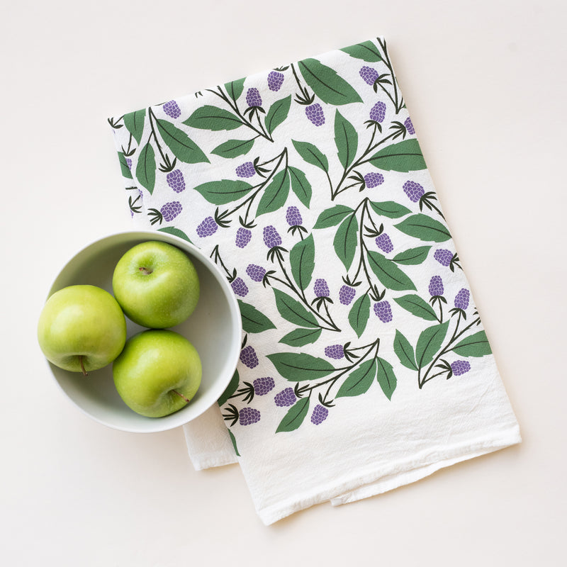 A single 100% cotton flour sack towel with an illustration of blackberries