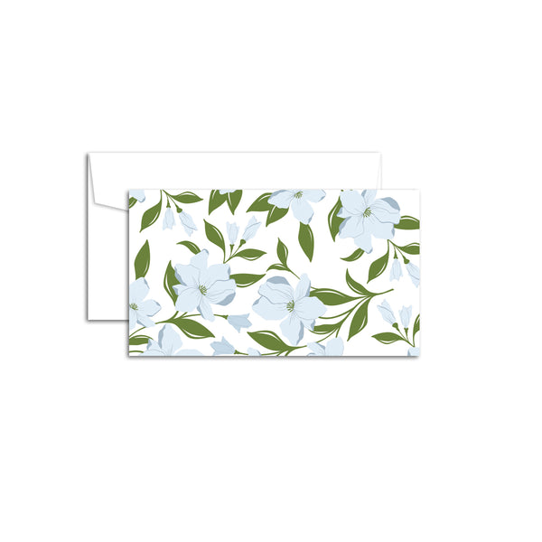 Set of 10 flat mini note cards with envelopes and an illustrated pattern of blue dogwood flowers and green leaves.