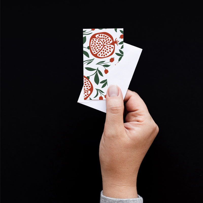 Set of 10 flat mini note cards with envelopes and an illustrated pattern of pomegranates with visible seeds and green leaves.