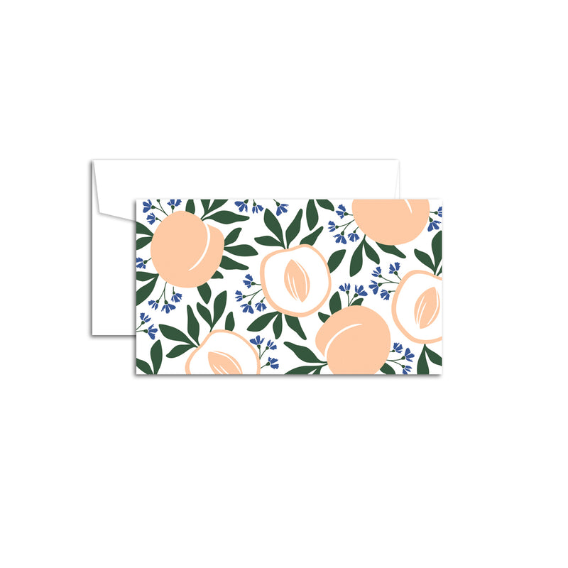 Set of 10 flat mini note cards with envelopes and an illustrated pattern of whole peaches and open peaches with visible pits in an alternating pattern plus green leaves and blue flowers sprouting from the peaches.