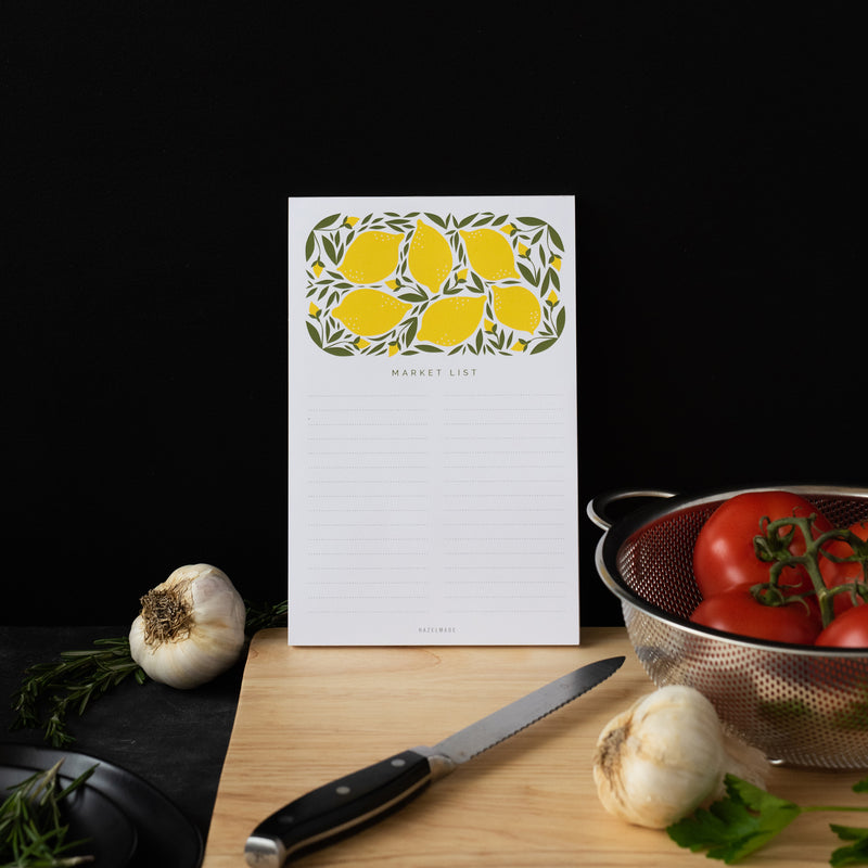 A single 5.5” by 8.5” large notepad with 50 tear-off sheets, an illustration of lemons, and text that reads "Market List".