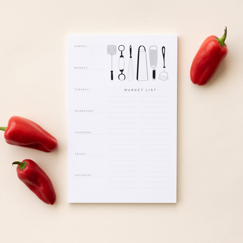 A single 5.5” by 8.5” large notepad with 50 tear-off sheets, an illustration of various kitchen utensils, and text that reads Sunday through Saturday on the left side and "Market List' on the right side.