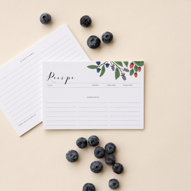 Set of 15 flat 4” by 6” recipe cards that have spaces for a recipe title, serving size, prep time, cook time, ingredients and directions with illustration details of blueberries, blackberries, and strawberries.