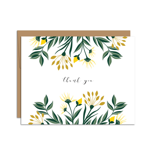 Single folded A2 greeting card with an envelope with an illustration of yellow aster flowers and green leaves sprouting from the top and bottom of the card. In the center is text in cursive that states "Thank You".