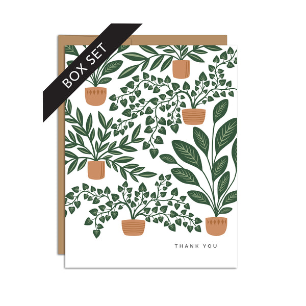 Box set of 8 folded A2 greeting cards with envelopes with an illustration  of multiple houseplants in pots. In the bottom right corner is text that states "Thank You".